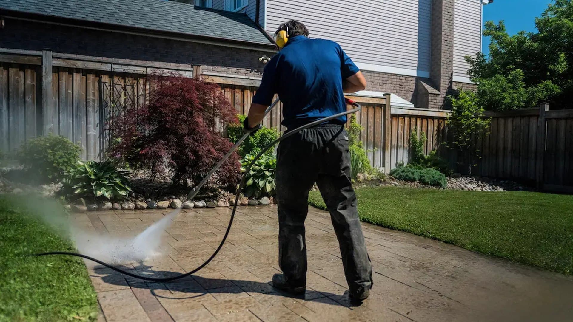 Blues Cleaning pressure washing in action